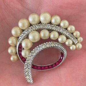 Vintage signed Ciner brooch with pearls, clear and channel-set red crystals